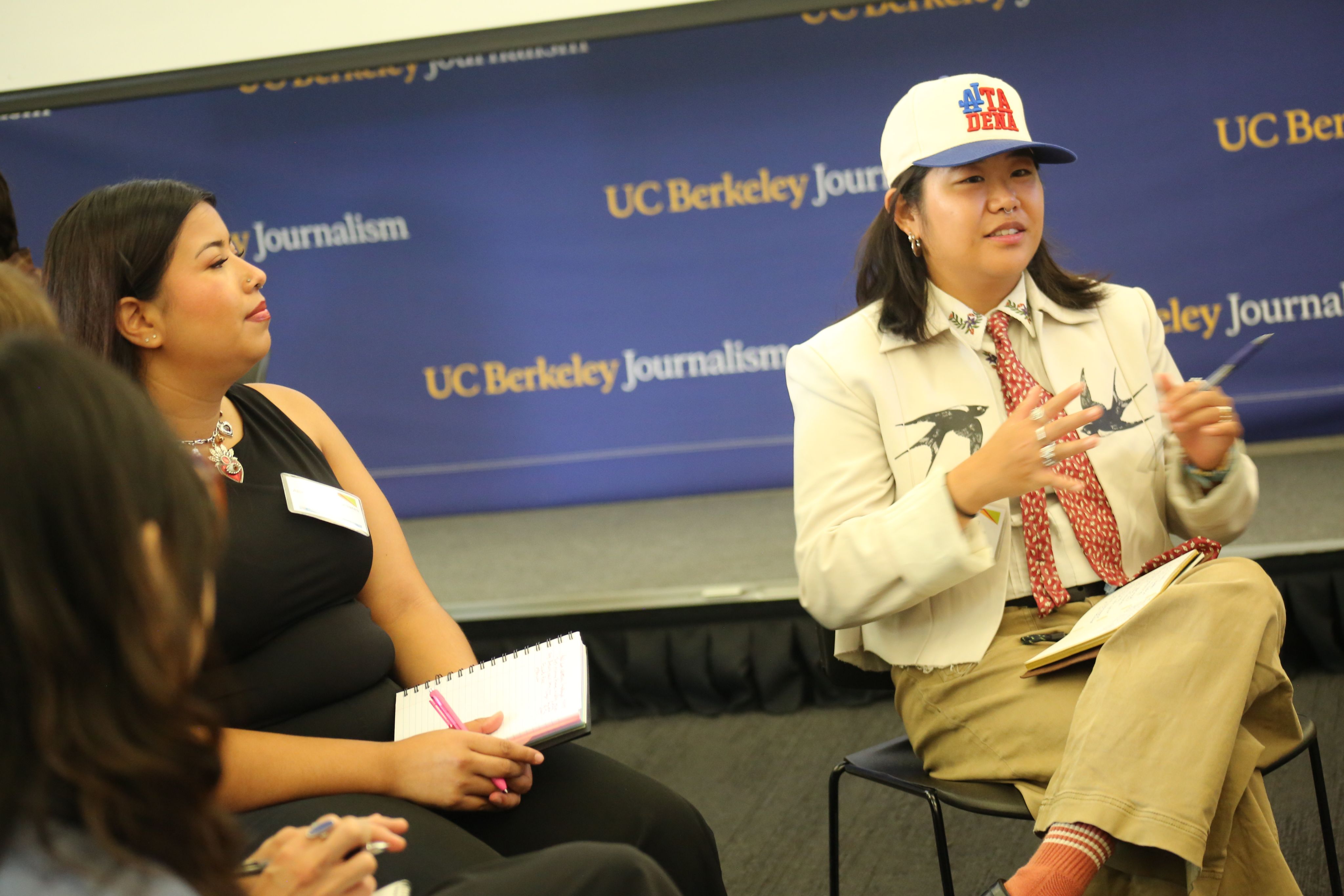 profile of a young woman's smiling face. 
