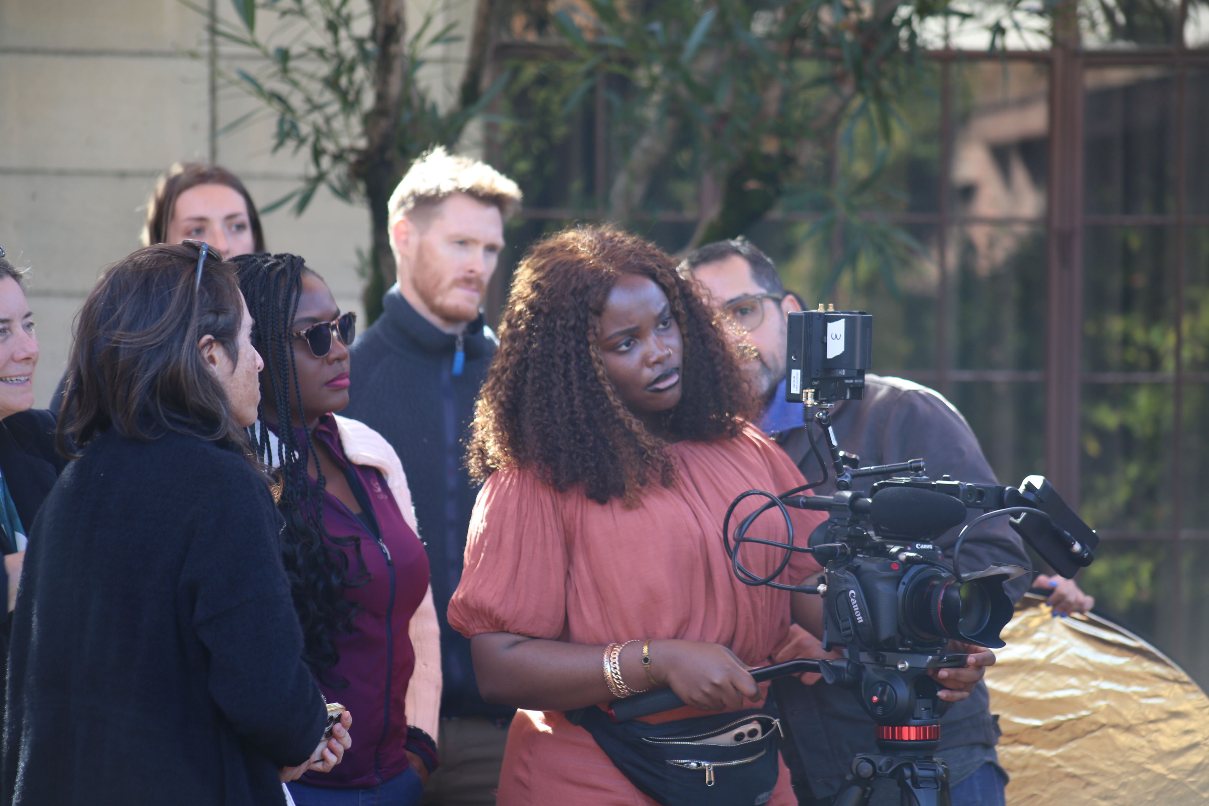 Photo of students shooting in courtyard