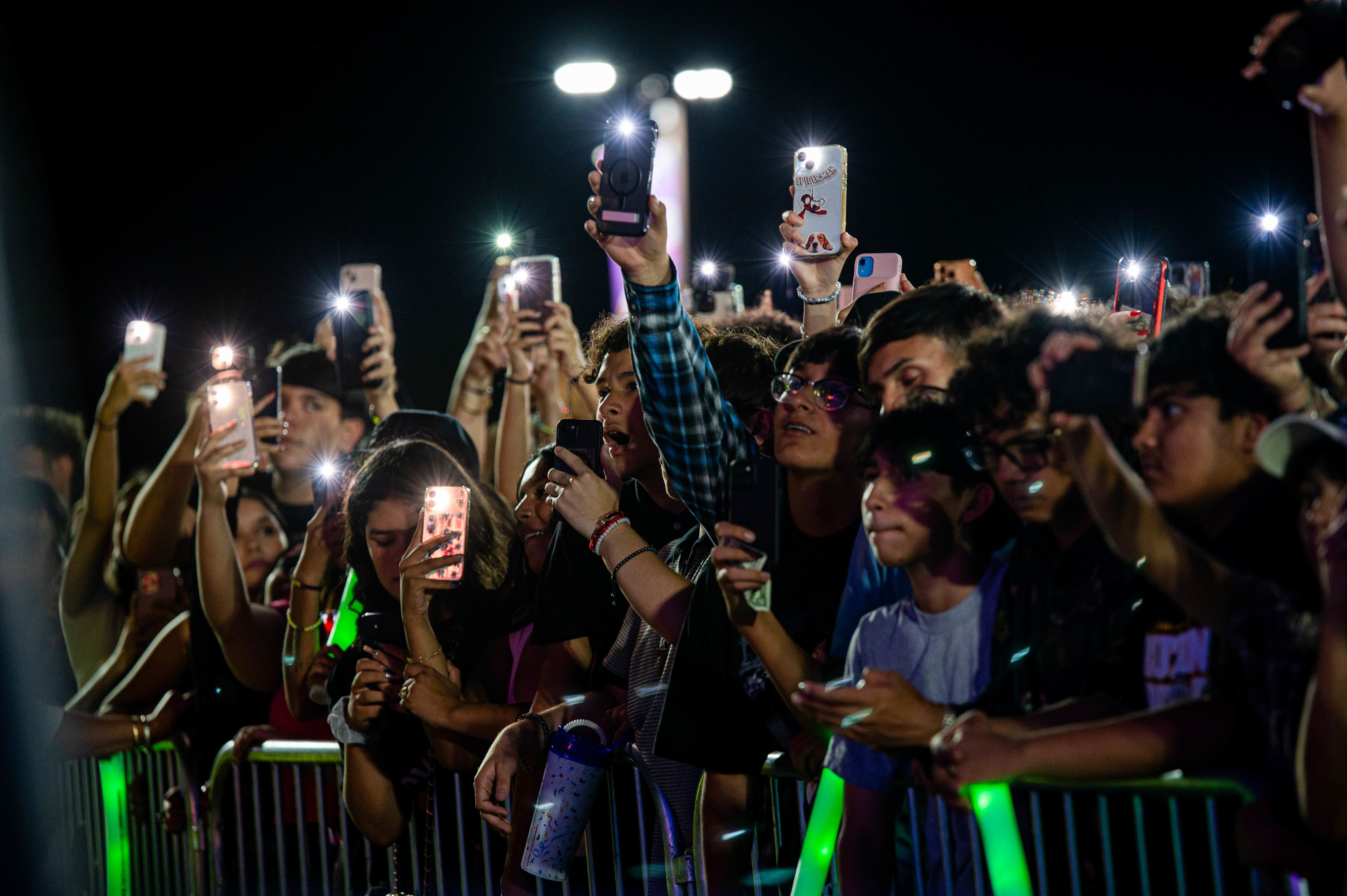 Photo of audience members watching a Mexican band perform before the 2024 US elections