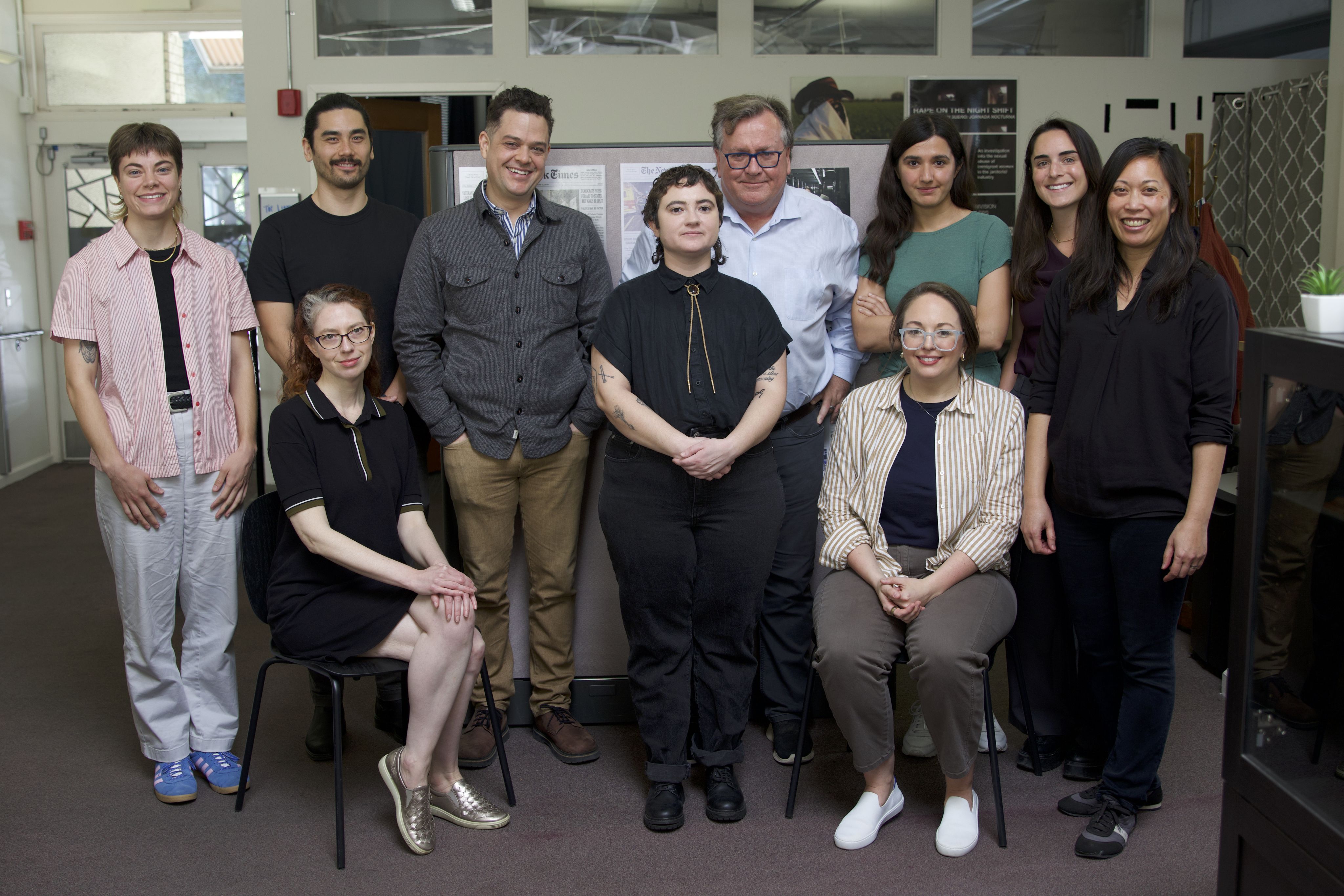 A group of people standing and sitting in posed positions. They are all staff of the IRP. 