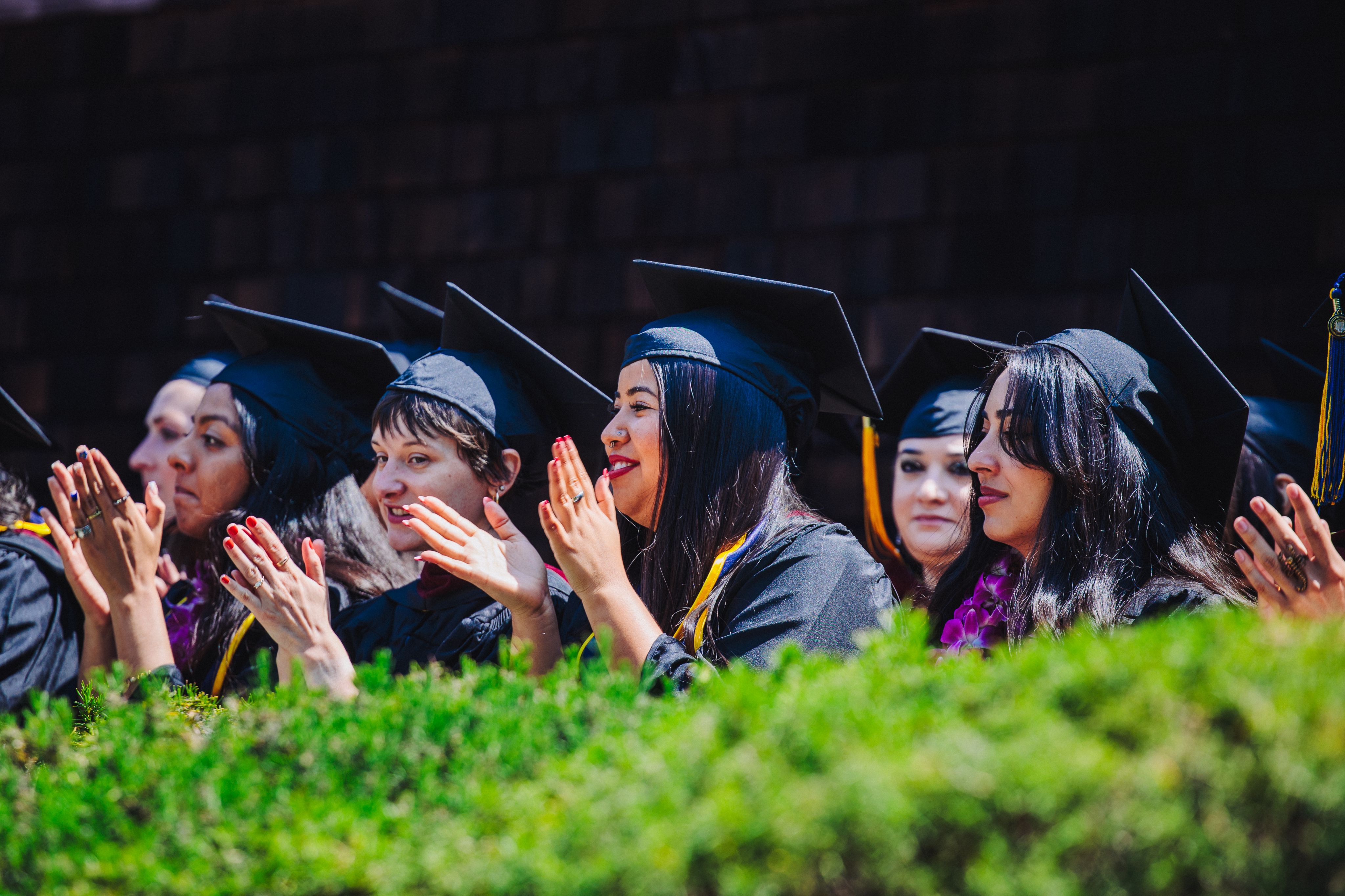 Photo of students shooting in courtyard